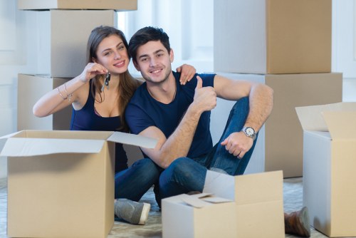 Removal team preparing household furniture for a local move in Shirley