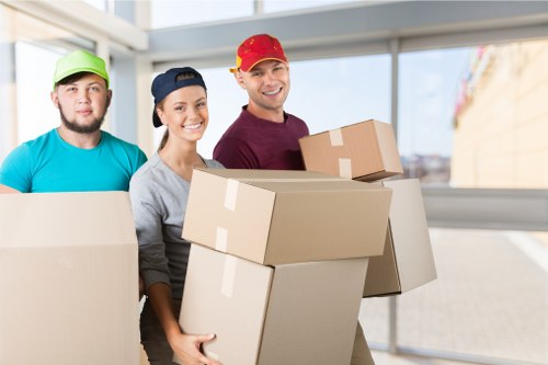 Furniture and boxes being transported by a Shirley moving van