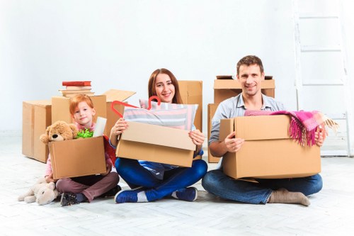 Packed moving boxes and household items ready for a Shirley home move