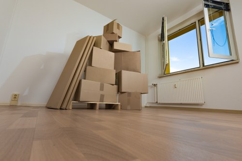 Professional movers loading items for a local Shirley relocation