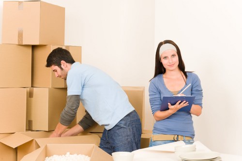 Furniture and boxes being loaded into a moving truck