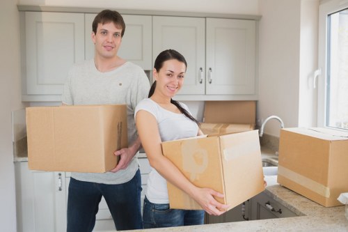 Local furniture collection team handling bulky items in Shirley